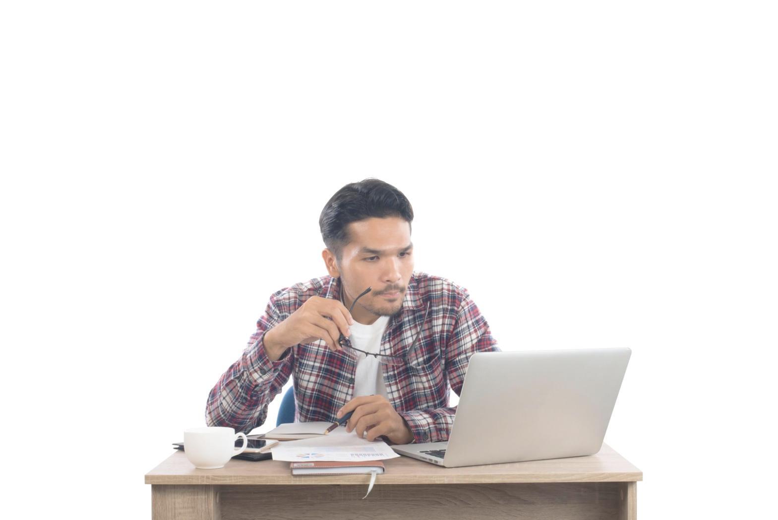 Professional reviewing financial documents and charts
